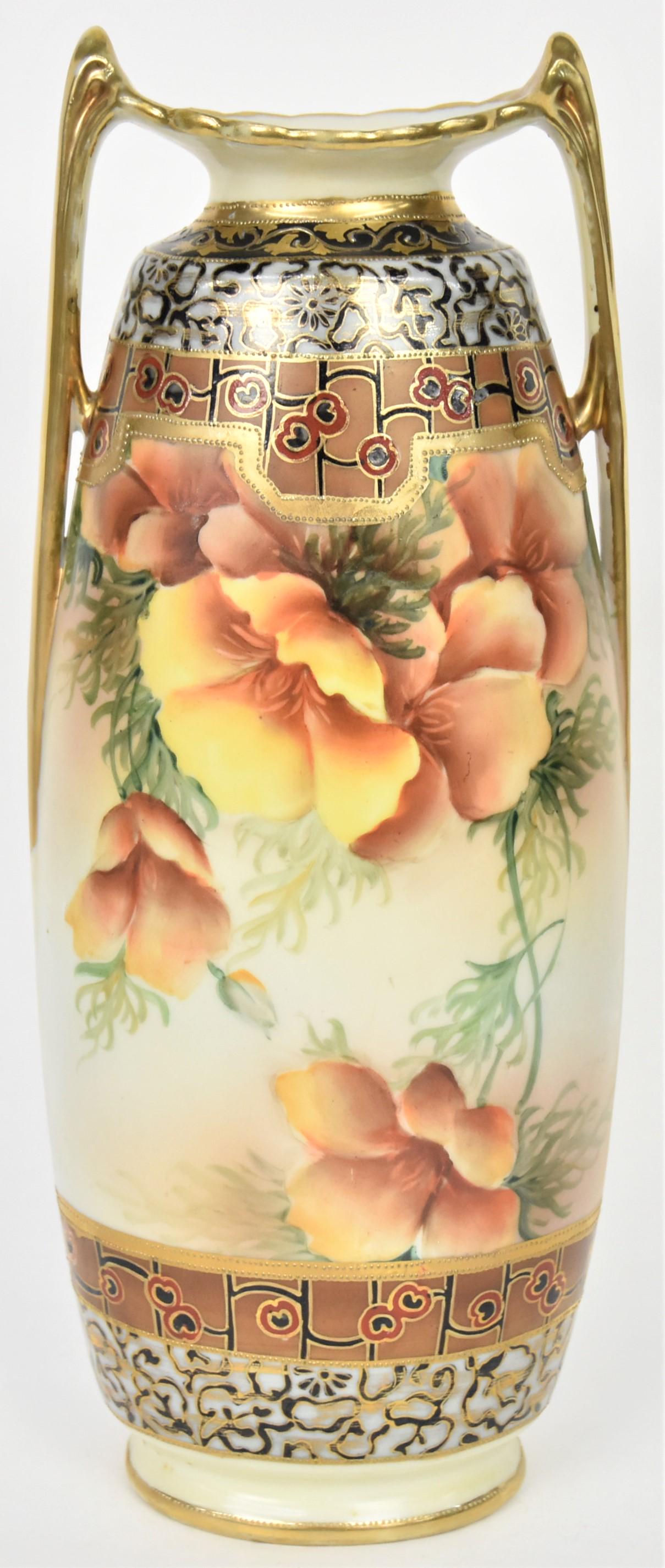 Tall Nippon Gold and Floral Handled Vase: Decorative different double borders. 12 3/4" tall, M in wreath logo. Pleasing and in good condition.