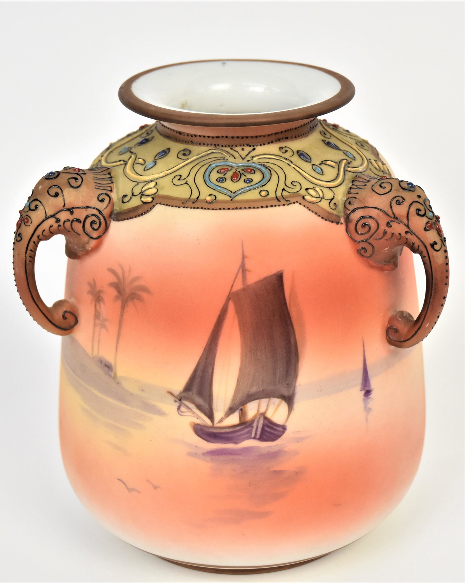 Nippon Moriage Egyptian Nautical Vase: Featuring triple elephant head handles and colorful collar. 6" tall, M in wreath logo. Handsome and in good condition.