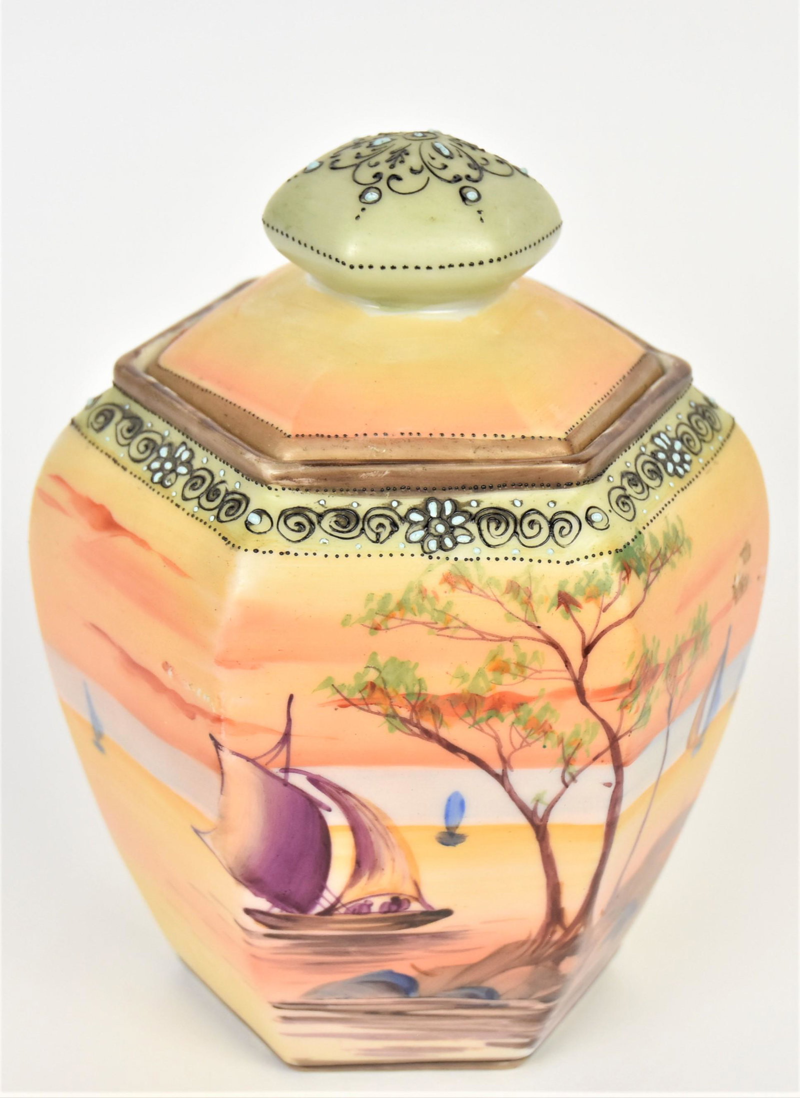 Nippon Jeweled Coastal Covered Humidor: Decorative Jewel and enameled collar and finial. 6 3/4" tall, maple leaf logo. Good condition.