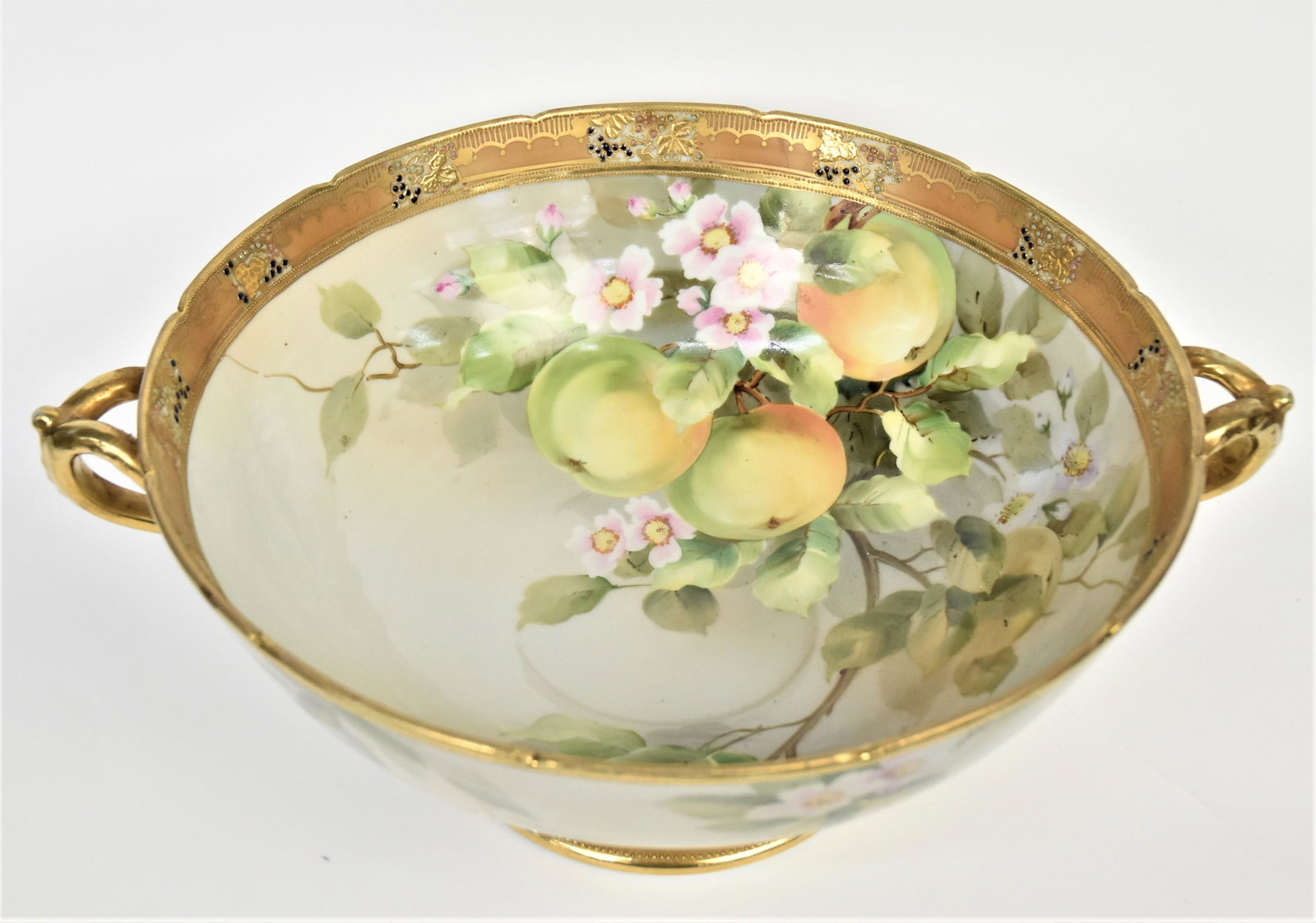 Huge Nippon Jeweled Apple Branch Punch Bowl: Featuring life size yellow apples and pink blossoms. Decorative raised gold and jeweled grape and leaf border. Gold wishbone handles. 6"tall, 13" diameter bowl. M in wreath logo. Impressive and in goo