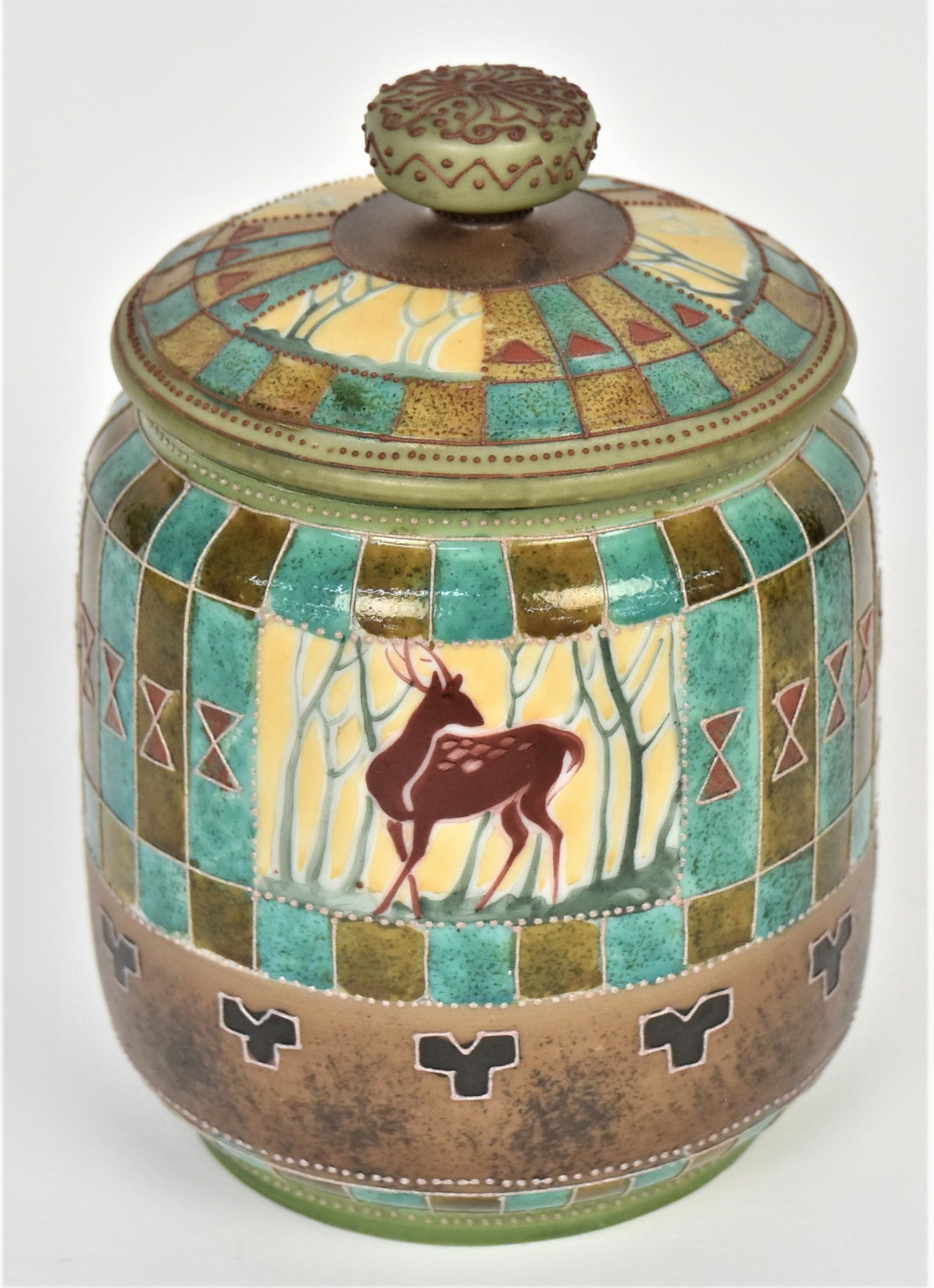 Nippon Stag Art Deco Covered Humidor: Nice turquoise and leather like enameling, M in wreath logo. Tiny surface enamel flaking at containers base and a shallow 1/4" nick inside rim, possibly factory related. Very handsome.