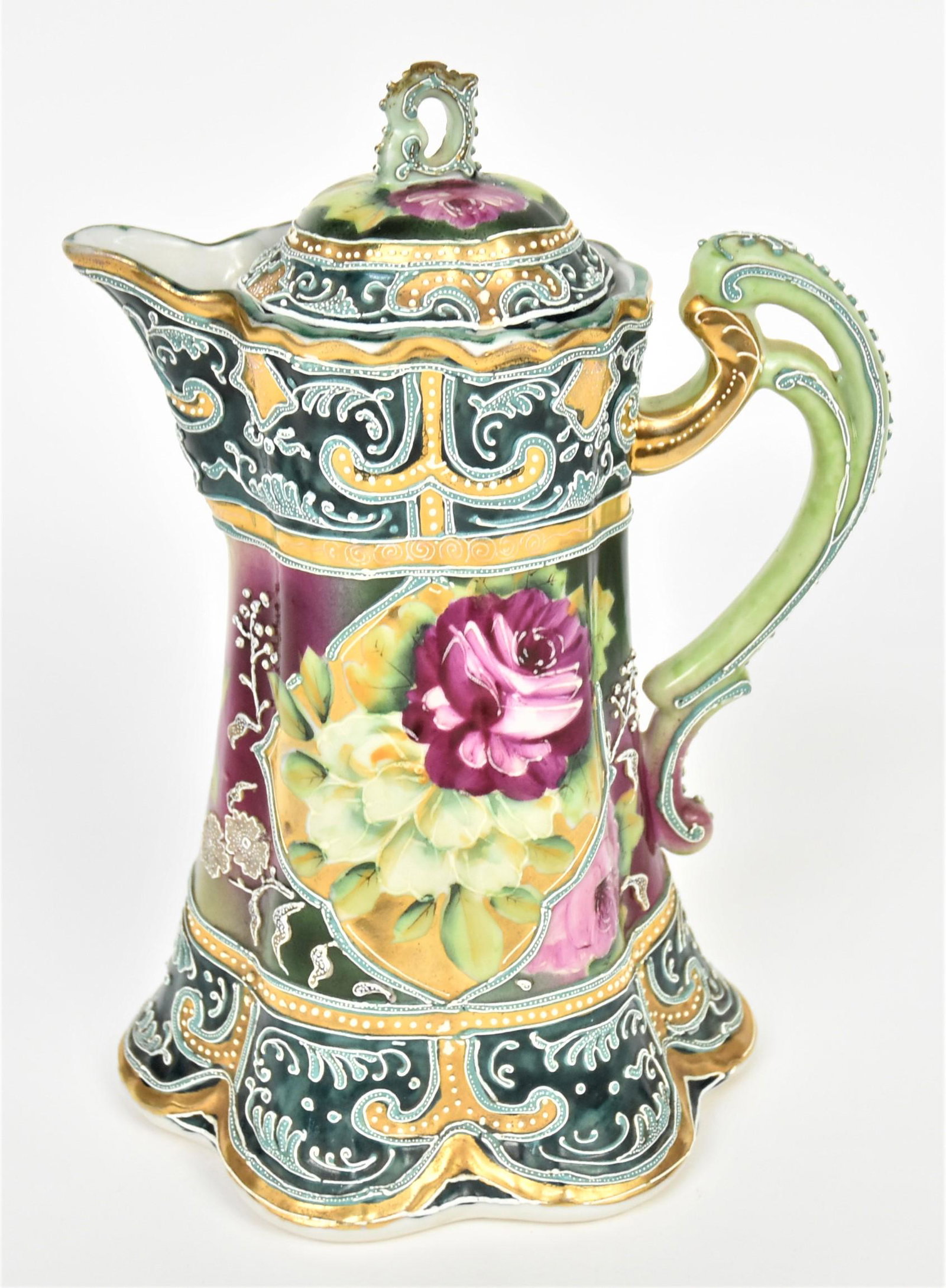 Nippon Moriage Roses Chocolate Pot: All over highly decorative, double scroll handles. 9 1/2" tall, unmarked. Tip missing on finial covered by unfired gold.