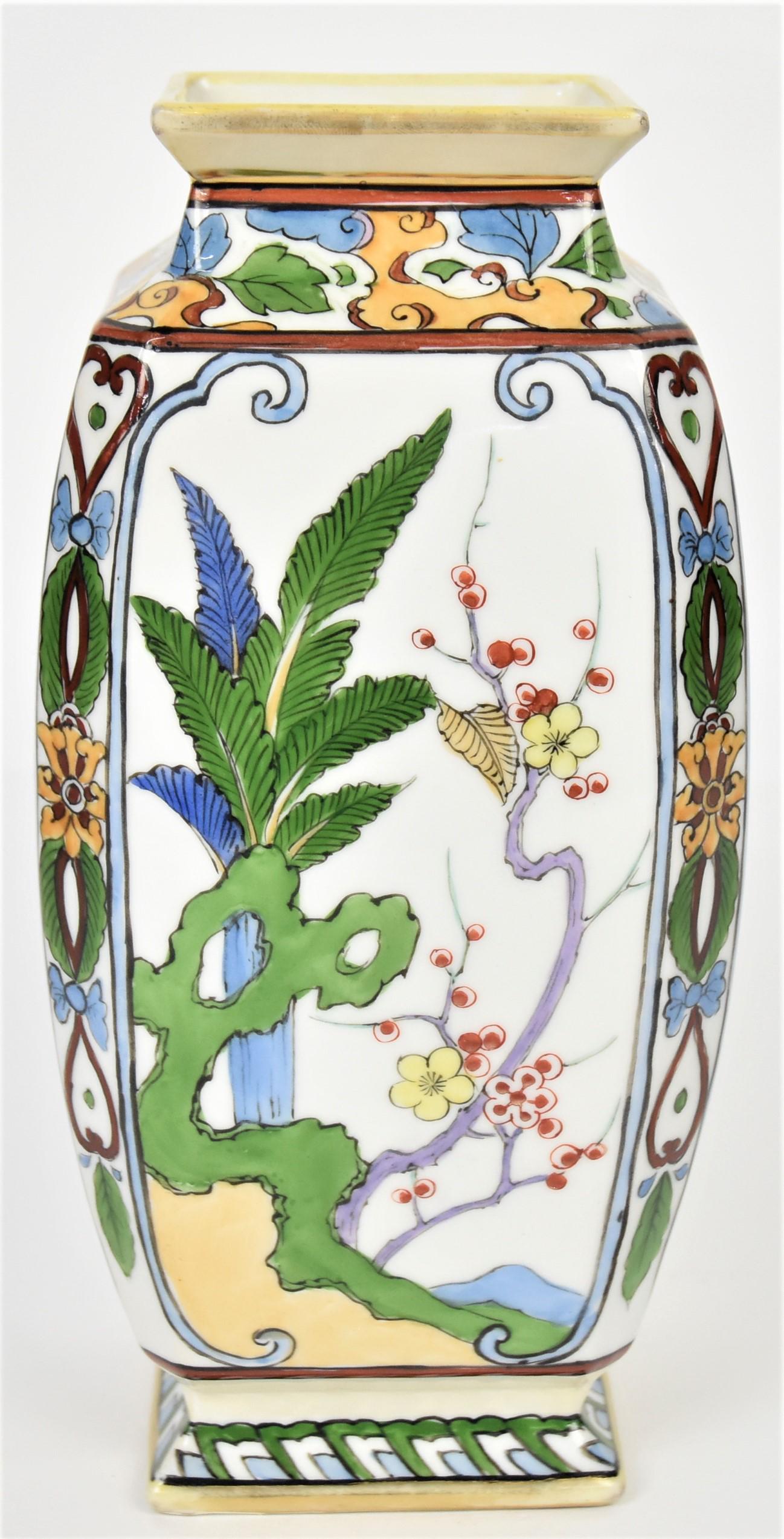 Nippon Stylized Oriental Floral Vase: Squared form with bold color ferns and flowers, 9"tall. M in wreath logo. Good condition.
