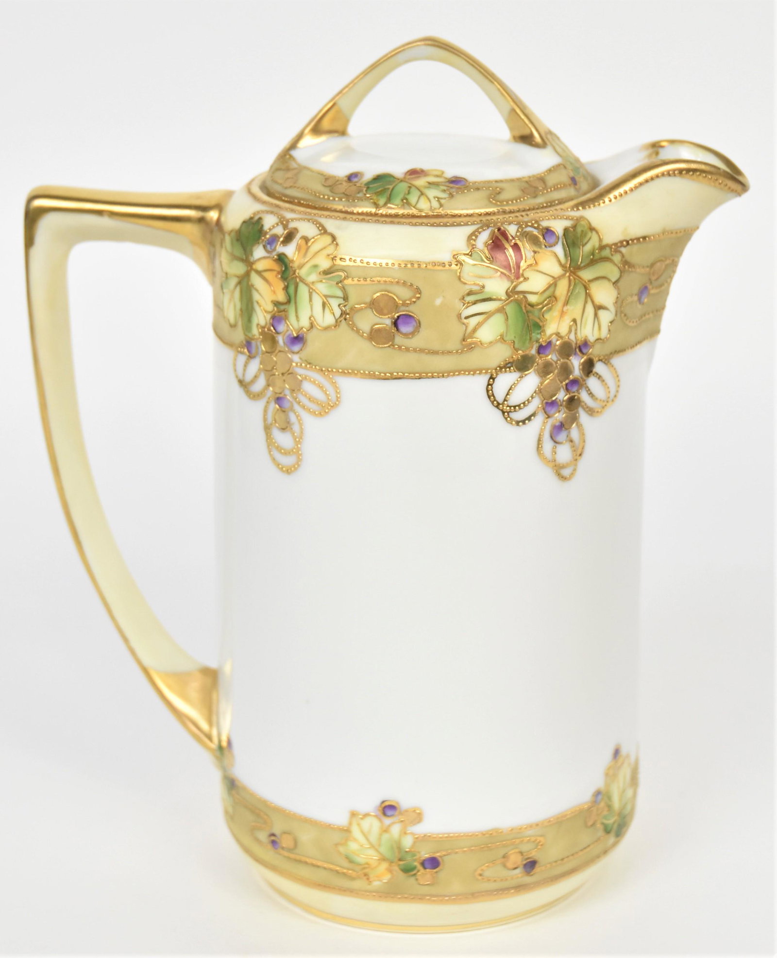 Nippon Beaded Grape & Leaf Tea Pot: 8" tall. Nicely decorated with fall leaves and raised gold swags. M in wreath logo. Attractive and in good condition.