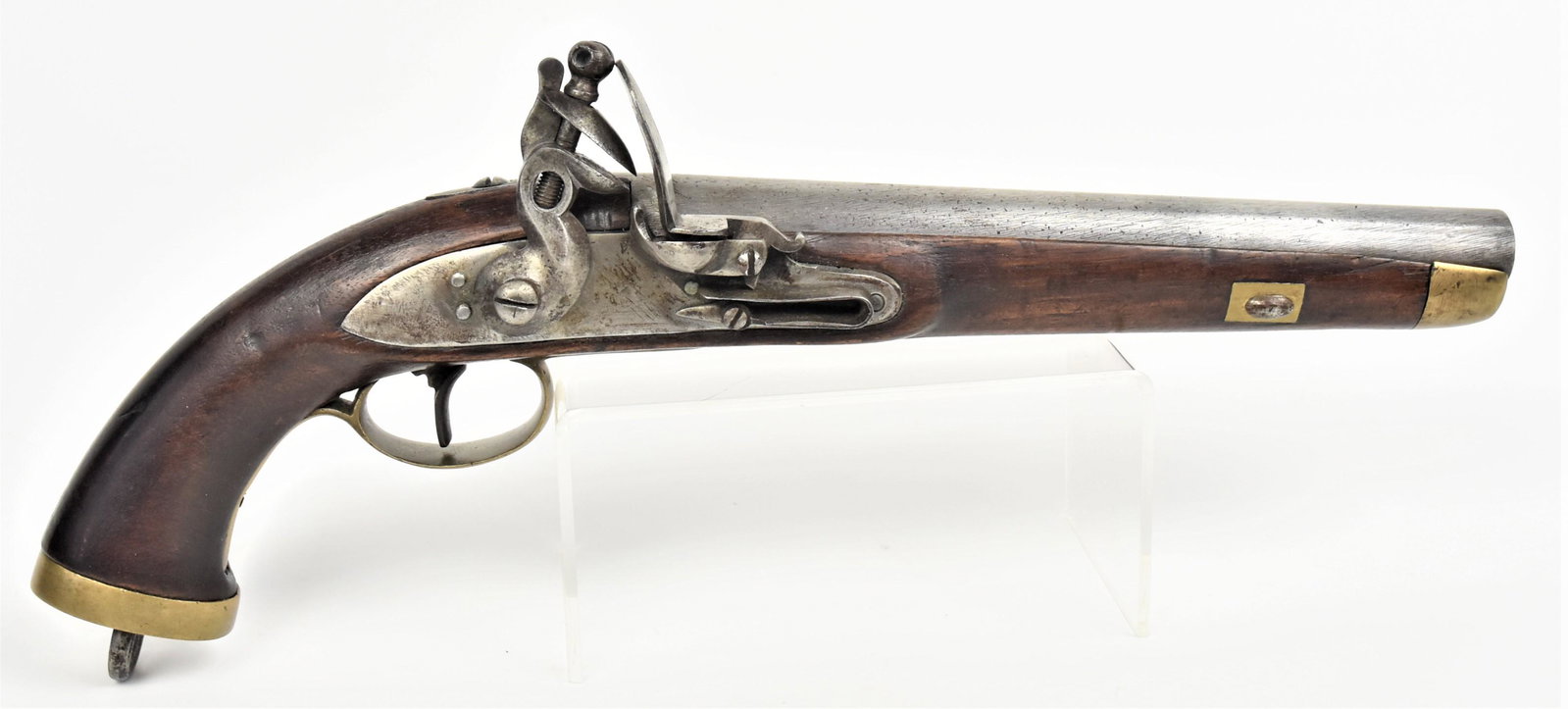 Belgian Flintlock Pistol: Circa 1800-20, marked with crowned Von lock plate, 9" round circa .65 caliber barrel, brass rigger guard, but plate, end cap with steel langet in butt plate, single piece walnut grip, 15" long. Condit