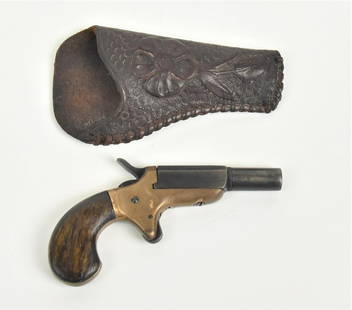 Single Shot Pistol: Circa .20 caliber, 2" long round to octagonal pivoting barrel, with brass frame and single piece walnut grip, 3 3/4" long with period tolled leather holster, 4" long. Condition worn finish, else VG.