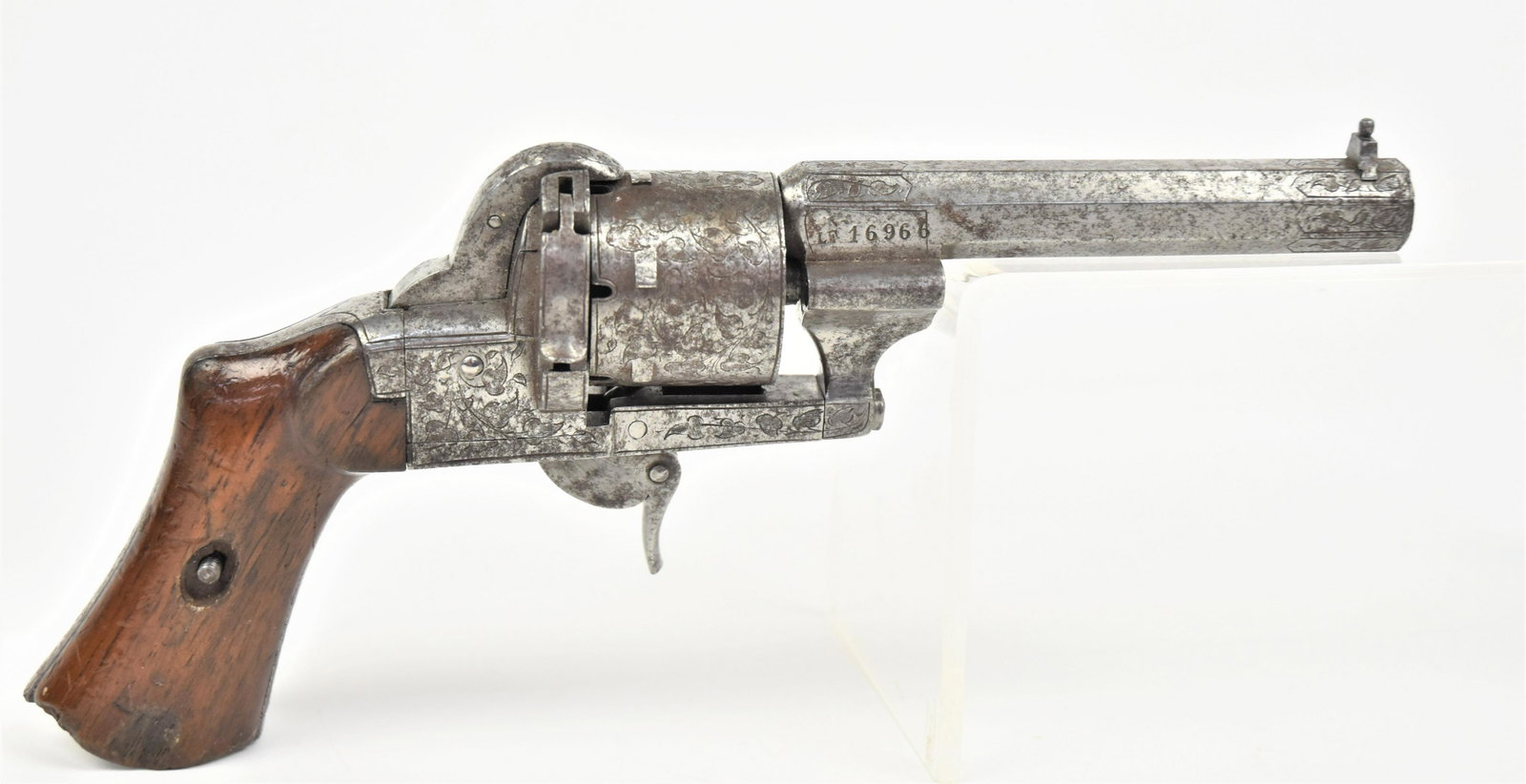 French LaFaucheux Pin Fire Revolver: Circa 1860s, with 3 1/2" octagonal barrel circa 1860s with 7mm six shot, beautifully engraved on nearly all metal surfaces with vining floral, standing bead on block front sight, folding trigger, mark