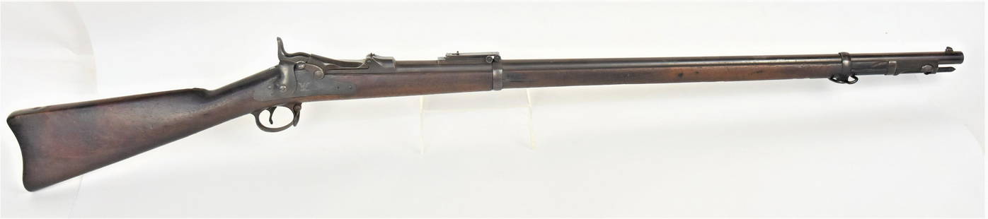 M 1884 Springfield Trap Door Rifle: .45-70 with 32" round barrel marked on lock plate with shield breasted U.S. spread winged eagle and U.S./Springfield, marked on trap U.S./Model/1884 and behind trap on frame with SN 506145, barrel