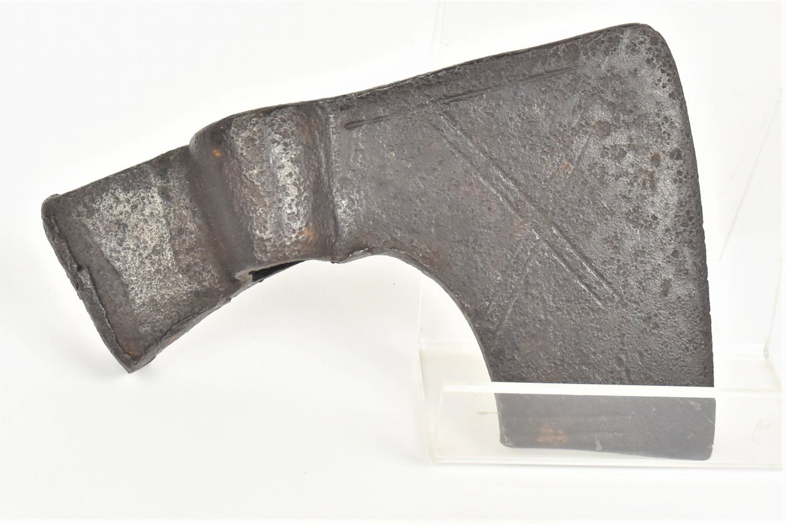18th Century Wrought Felling Axe: Iron found near Ft. Johnson, N.Y., earlier style than the above example, with engraved design on blade, circa 1700-30 and possibly French, 9" x 6 1/4" high, form. Ft. Johnson in the Mohawk valley was 