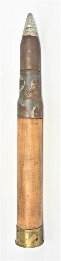 Large Artillery Shell: Marked on base Dummy Cartridge MK 5C CAL with three part steel projectile brass base and wood shaft, 4 1/4" diameter x 33 1/2" high.