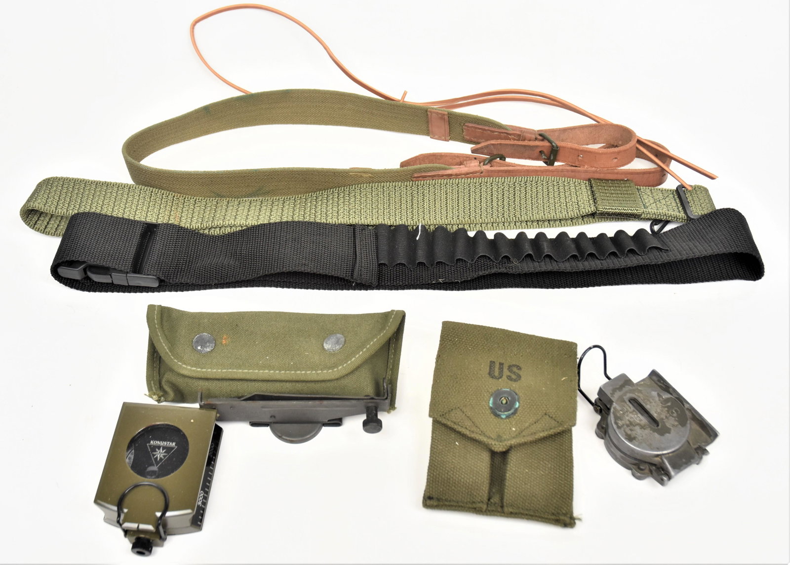 Military Compasses Plus: Lot of 8, including a folding compass marked U.S. Compass Magnetic NSN 660-01-196-6971 Stocker & Yale Inc. Beverly Mass.., 3" long closed; plus folding compass marked Konustar, 4" long closed; plus gr