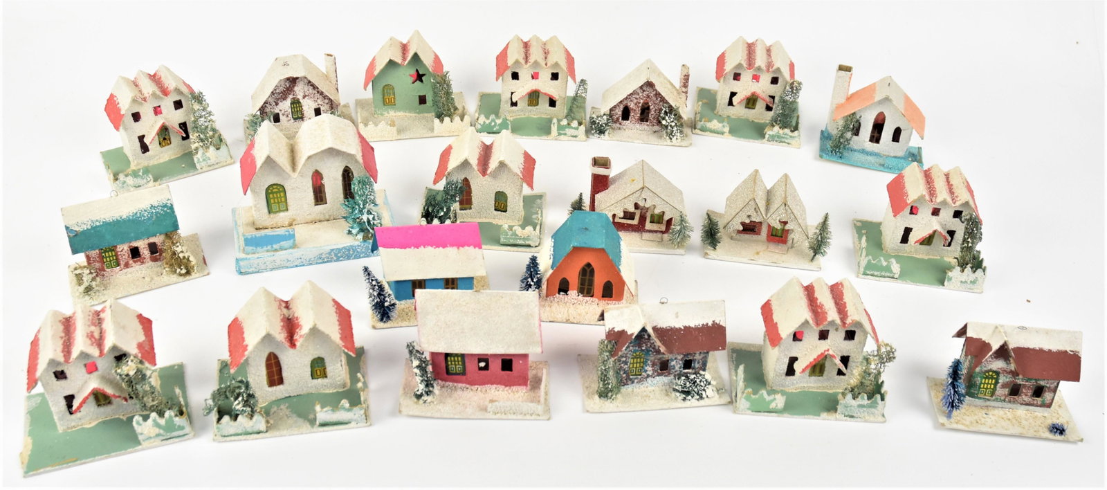 Christmas Village: Early Japanese card stock decorated hoses and churches, marked Japan, lot of 21, all circa 1950s, holes in back for lights, 2 1/2 to 3 1/2" high. Condition VG.