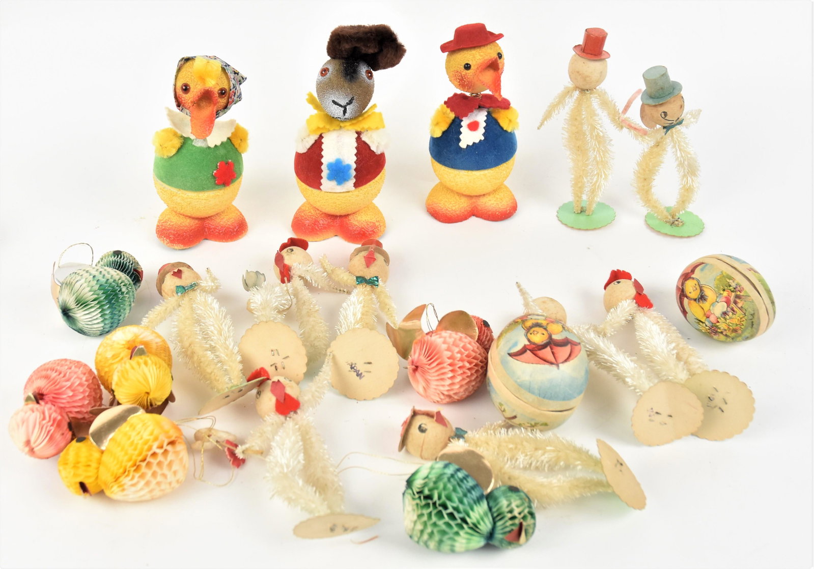 Huge Lot of Eater Decorations: Lot of 20, including boxed set of three Japanese figural candy containers with two ducks and one rabbit, all hand painted with cloth outfits and glass eyes, ducks 5" rabbit 6" high; plus six crepe pap