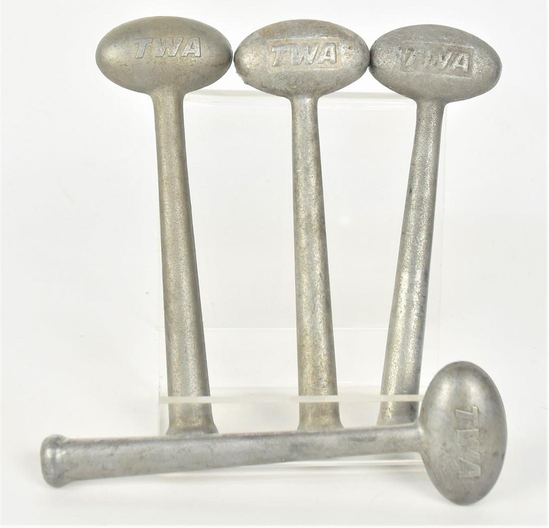 TWA Aluminum Hammers: Ice breakers lot of four, with relief TWA on one side, 2 1/2 x 1 x 8" long. Condition VG to Fine.