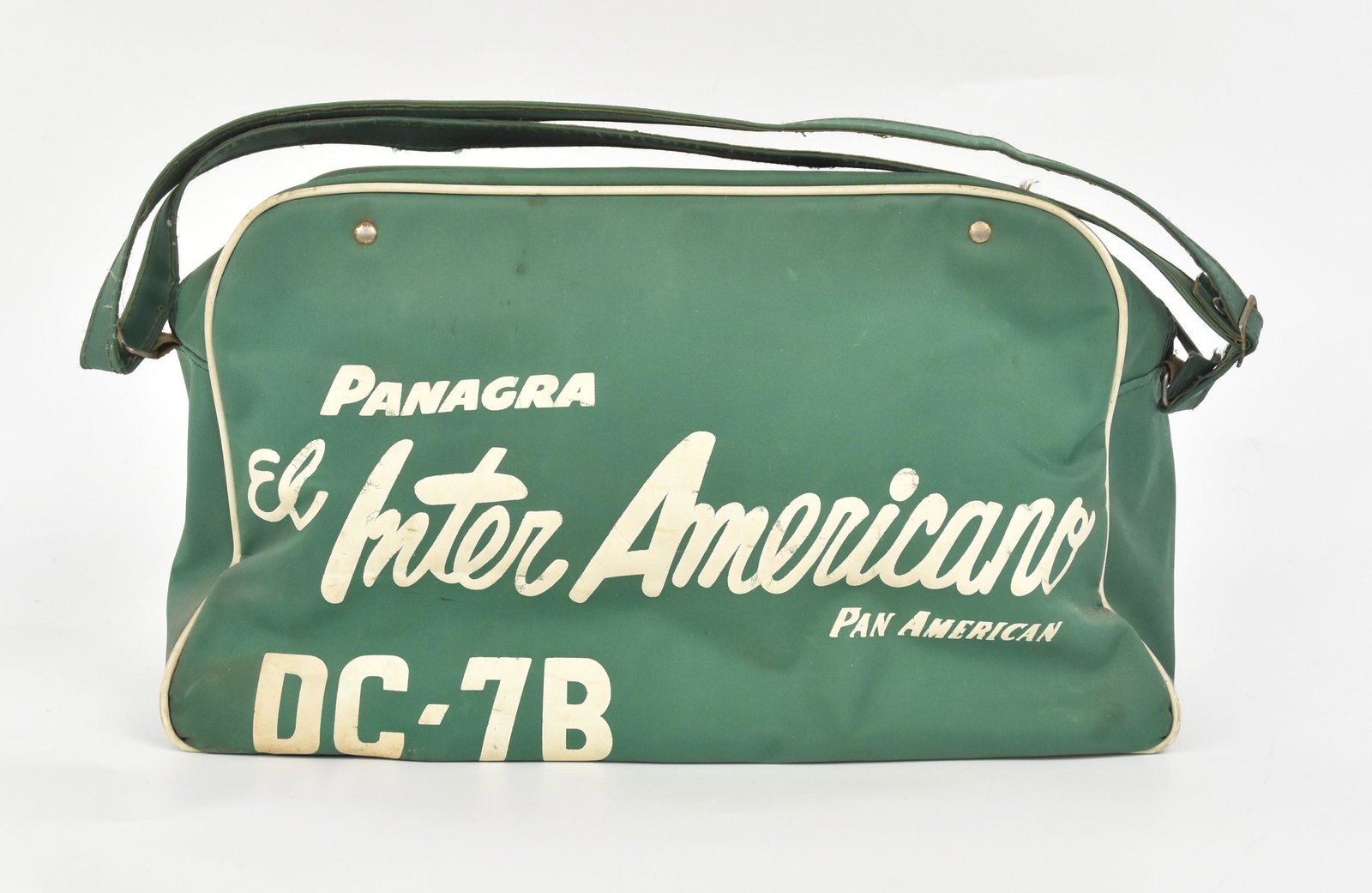 Pan Am Airline Carry On Bag: Green Rayon with white text on each face reading: Panagra El Inter Americano Pan American DC-7B, with adjustable shoulder strap and zipper closure, 14 1/2 x 6 x 8" high, less shoulder strap. Douglass 