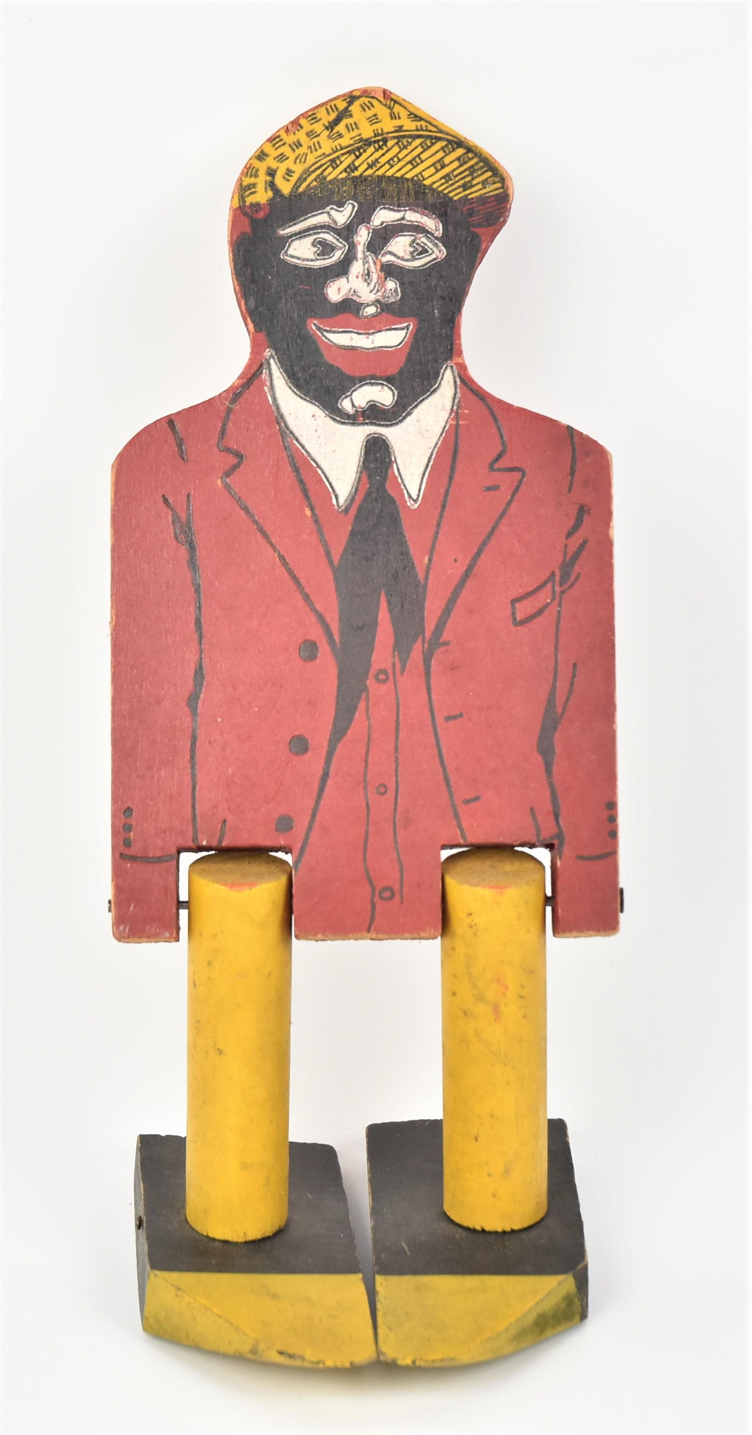 Stepin Tom Wood Toy: Marked on back as above and Sturdy Manufacturing Co. Sturgis, Mich. Pat Pending, in original poychrome paint 5 1/4 x 5 1/4 x 13" high. Condition paint circa 96%.