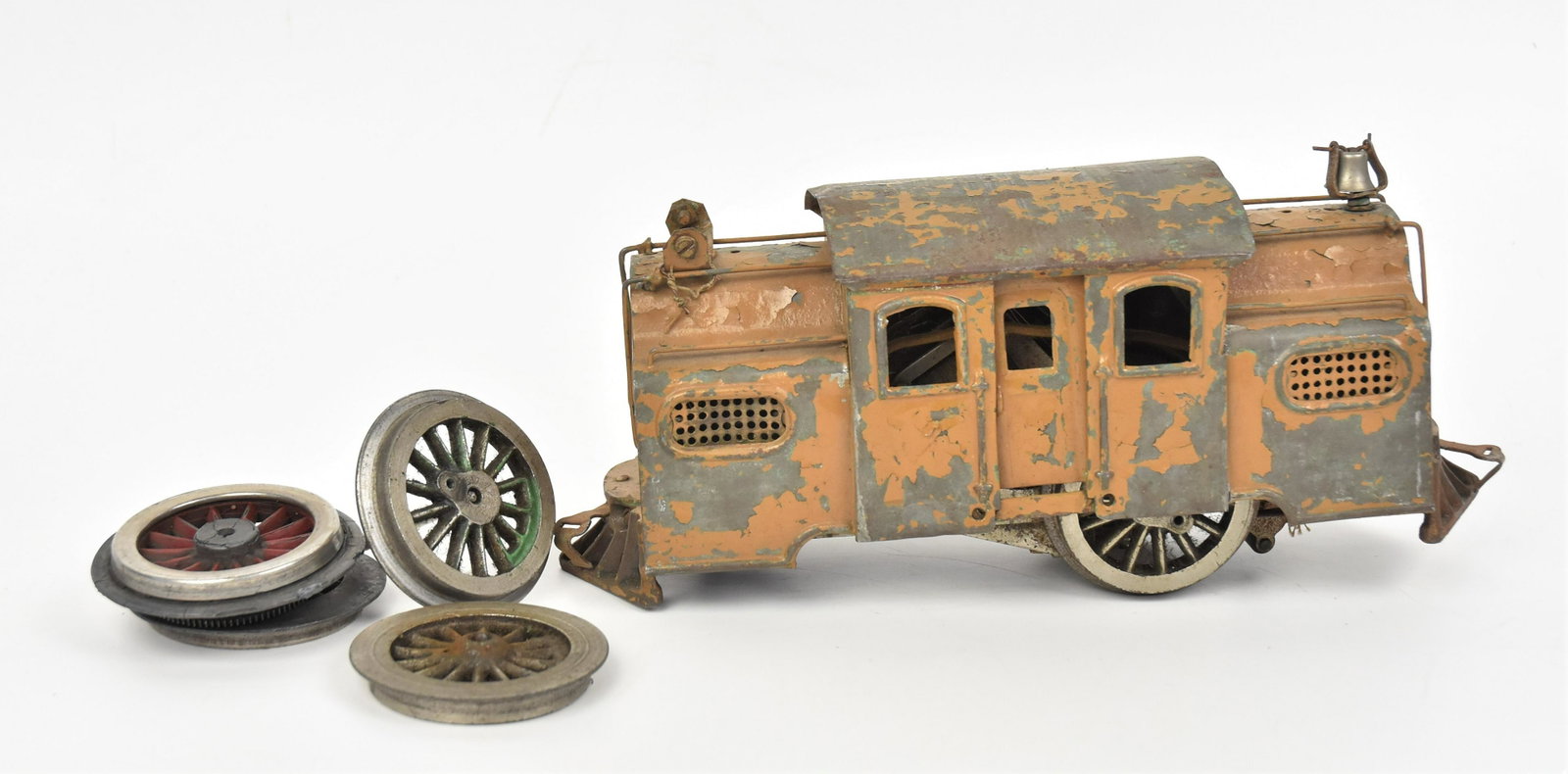 Lionel Standard Gauge Locomotive: In worn original paint with lables on front and rear, in pieces with six wheels, 11" long. Condition may be missing parts, paint 55% and flaking.
