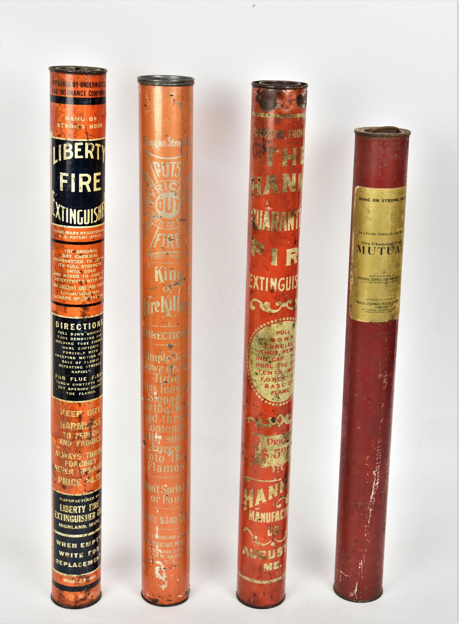 Four Early Tin Tubular Fire Extinguishers (1 of 3)