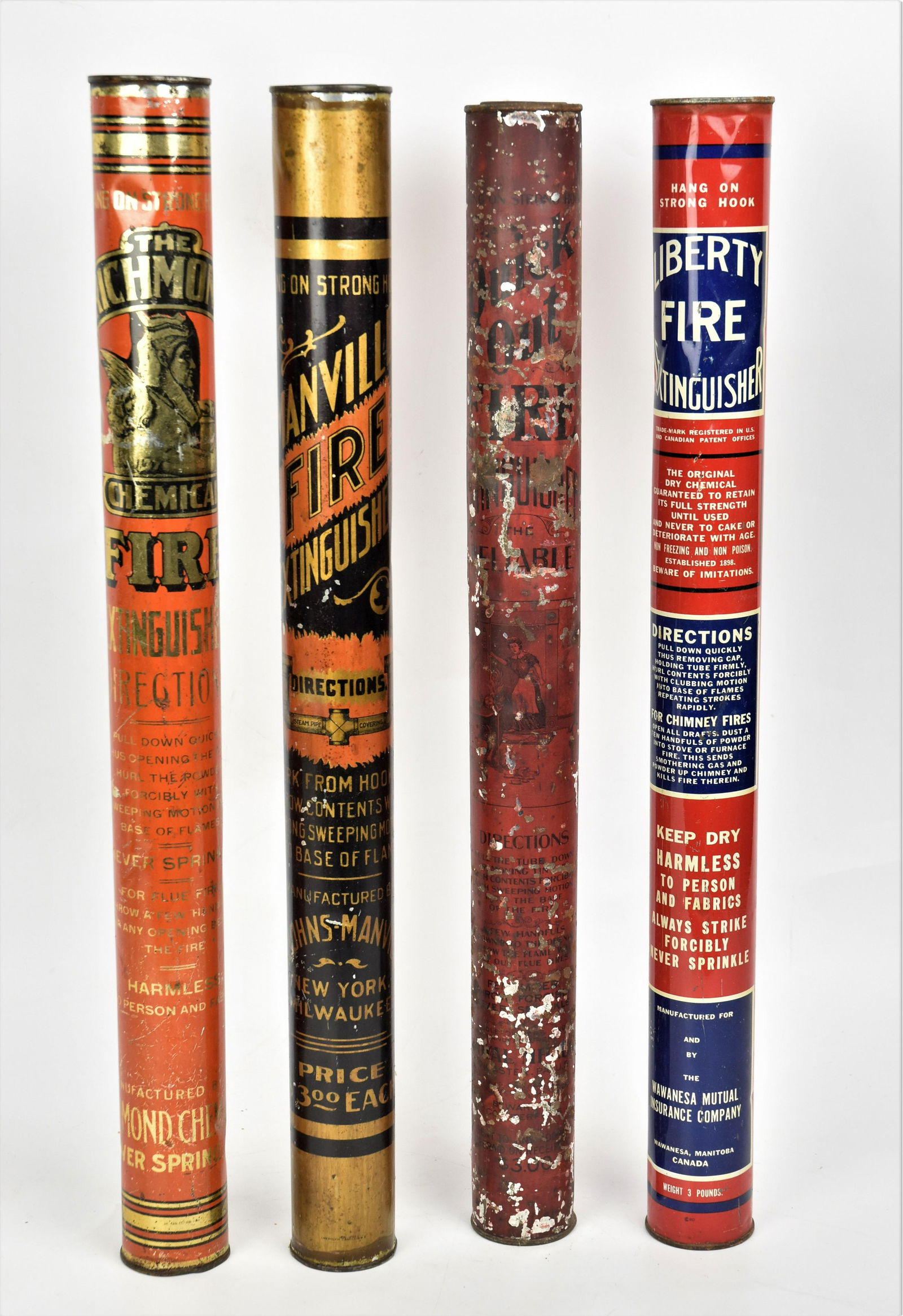 Four Early Tin Tubular Fire Extinguishers (1 of 3)