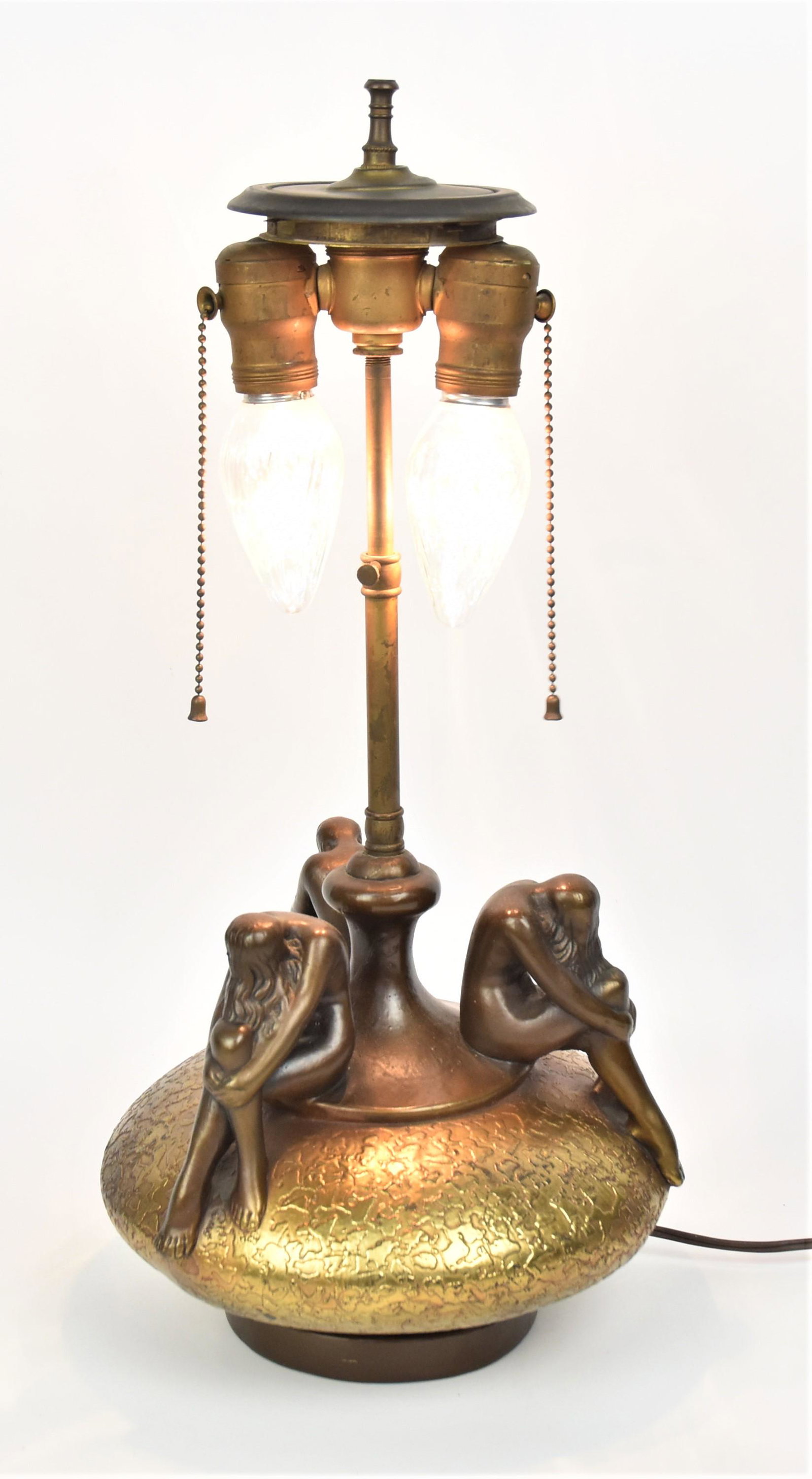 Art Deco Olive Kooken Nude Figures Lamp: Table Lamp with three art deco kneeling nude figures, textured finish with bronze layer over heavy chalkware. Original shade and cap, good condition.