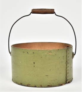 Bentwood Carrier with Old Green Paint: Spruce with original green painted finish, lapped and tacked construction, with heavy gauge wire swing handle with turned maple grip, nice old patina, 10" diameter x 5 1/4" high, less handle.