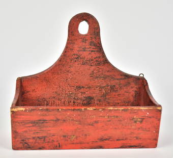 Decorated Hanging Candle Box: White pine with nailed construction tombstone crest with cut-out oval for hanging, scroll cut sides, in original yellow paint with early red over-paint, 13 1/2 x7 x 12 1/2" high. Condition paint