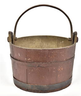 Early Wooden Bucket with Old Brown Paint: 19th century spruce & hickory in original brown painted finish with gray painted interior, stave constructed with two steel bands and bent hickory swing bale handle with turned maple pegs attaching