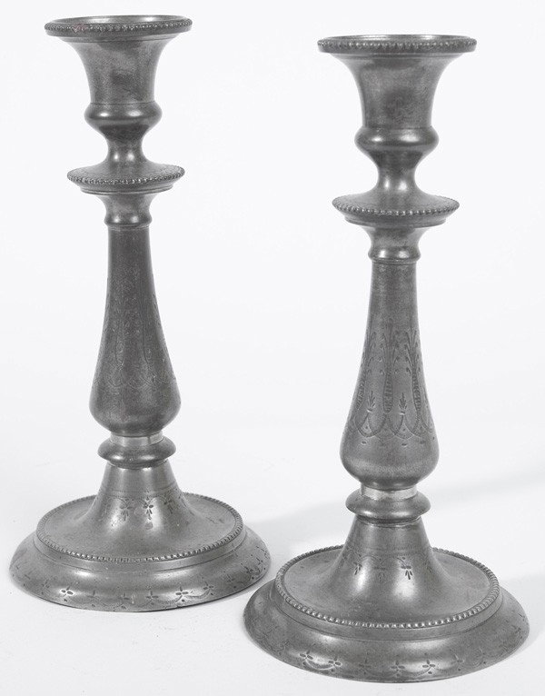 PR. 19TH CENTURY ENGRAVED PEWTER CANDLESTICKS: Engraved designs and beadwork on edges. Retains push-ups. Slight bend to base, otherwise nice condition. 11" high.