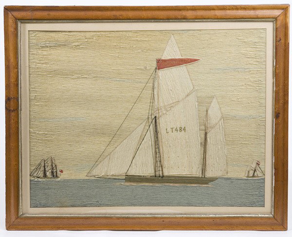 NEEDLEWORK WOOLIE OF ENGLISH SHIP JOHN FREDERICK: 18 3/4" X 24 3/4" 19th Century needlework of ship with British flag that reads "John Frederick" and also has LT484 on mast. One smaller ship is to each side. Original figured maple frame. Excellent co