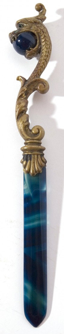FINE BRONZE & AGATE LETTER OPENER: Late Victorian with a gilt bronze dragon form handle with blue agate eyes, glade and agate ball in mouth of dragon. One eye missing and worn gilt. 7" long.