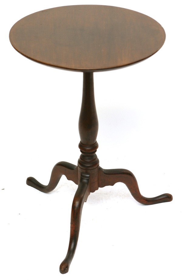 QUEEN ANNE CHERRY CANDLE STAND: Circa 1760-1780. Nice old red finish to base. Original top. Old repair to one leg, otherwise very good condition. 26" high x 18 1/4" diameter.