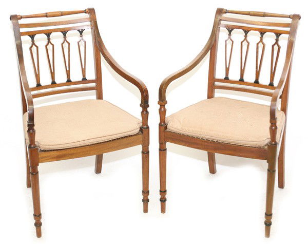 PR. OF PERIOD CLASSICAL BIEDERMEIER ARM CHAIRS: Early 19th Century arm chairs with handrail, turned legs and caned seats. Old label on bottom which reads "Amelia Maria Pereira". Few old repairs, otherwise good condition. 35" high x 22" wide x 19" d