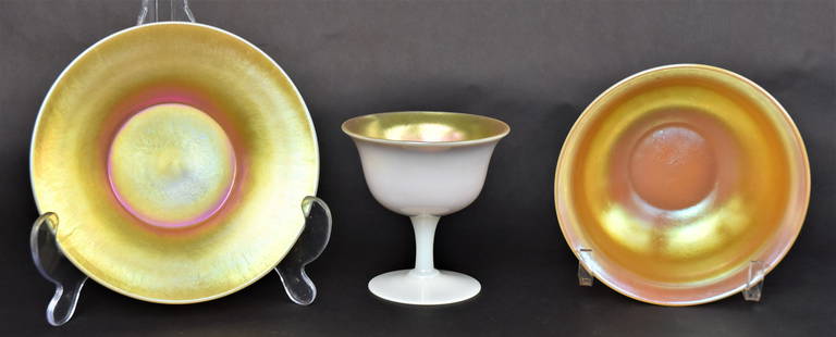 Three Piece Steuben Art Glass Sherbert Set: Gold Calcite sherbert 4" H, Undertray 6" Dia, Bowl 2 1/4" H x 5 1/2" Dia. All in good condition.