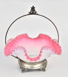 Pink Satin Art Glass Brides Bowl: Crimped ruffled rim mounted within holder 12" H - Lion Marks, solder repair to handle. Basket very good condition.