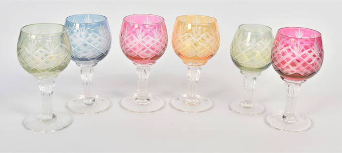 Six Bohemian Multi-colored Cordials: With wheel cut cross-hatch designs clear reeded stems. 4 1/2" H. All in very good condition.