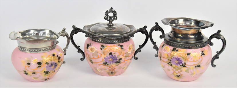 Matching Victorian Pink Satin Set: With floral designs, a 4 3/4" waste bowl, a 5 3/4" covered sugar and a 4" creamer. Pretty in Pink. Condition VG.