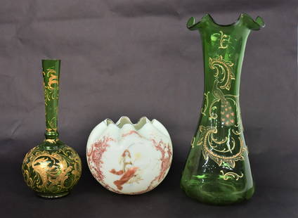 Art Glass Vases Plus: Lot of three, including a large 6 " diameter x 5 1/4" high Rose bowl with transfer of lady in cresent moon & enamel design; plus two emerald green vases 12 1/4" high; plus 2nd with optic ribbed with