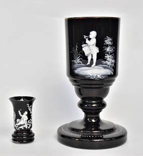 Two Vintage Black Ruby glass Mary Gregory Enamelware: 9 1/4" Urn and 3 1/4" vase. Good condition.