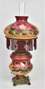 Original Gone With The Wind Parlor Lamp: The shade and base hand decorated with large boquets of heirloom ruby roses. Decorative ruby beading, antique electrical cord. 21 1/2" to top of shade, seldom seen factory original. Good condition.