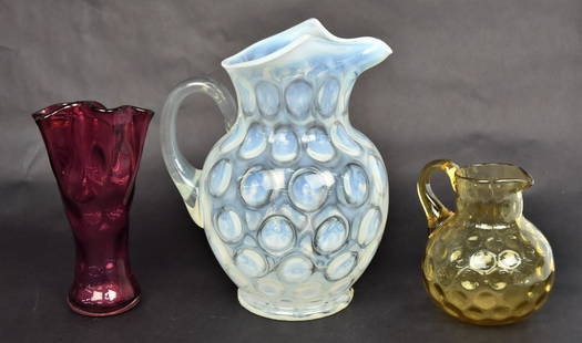 Three Coinspot Art Glass Pitcher, Plus: Large 9 1/2" opalescent pitcher, a 5" amber mlik pitcher plus a 7 1/2" ruby handerchief vase. Good condition to all.