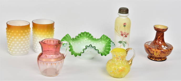 Lot Of Art Glass Items: Includes a 7" dia green bowl in James Tufts, quadruple plate holder, a 5 1/2" shaker with floral, pair 3" hobnail tumblers, 2 creamers, 3" & 3 1/2" plus a 4 " tortise shell vase. All good condition.