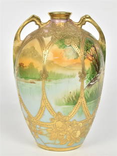 Nippon Hand Painted Vase: With lake landscape surrounded by raised gold floral ornaments, 8"H, highly decorative. Good condition.