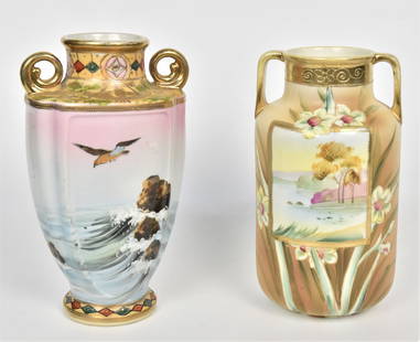 Two Nippon Handled Vases: A 8" with seagull & costal scene with raised gold trim, a 7 1/2" with landscape & daffodils, attractive . Good condition.