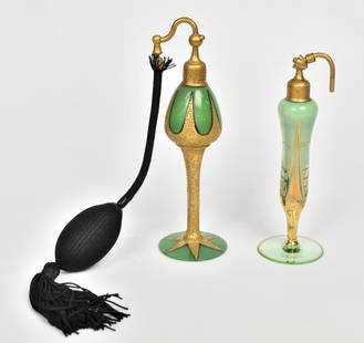 Two Art Deco Atomizer Pefumes: A 7 3/4" marked DeVilbiss with gold textured surface with bulb, plus a 6 3/4" art deco design atomizer. Good condition.