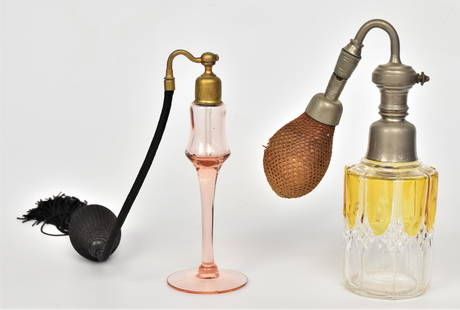Two Atomizer Perfumes: A Baccarat style 7 3/4" with original bulb, plus a 6 1/2" Depression pink. Good condition.