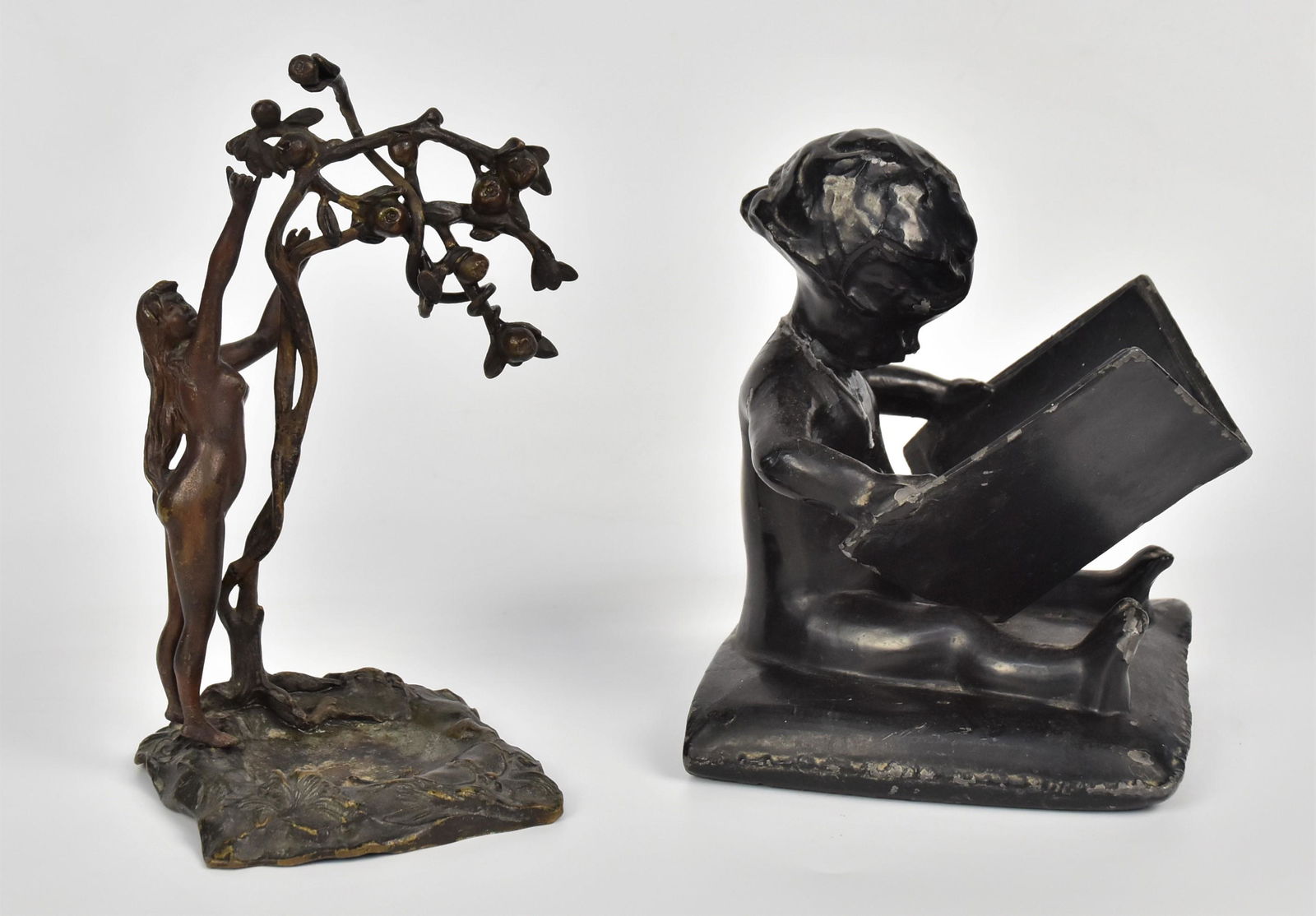 Bronze Eve Under Apple Tree Sculpture, Plus: Eve under apple tree 7 1/2" x 5" across, unmarked good condition. Plus child reader bookend 6"H x 5"W. Condition neck repair & enamel loss.