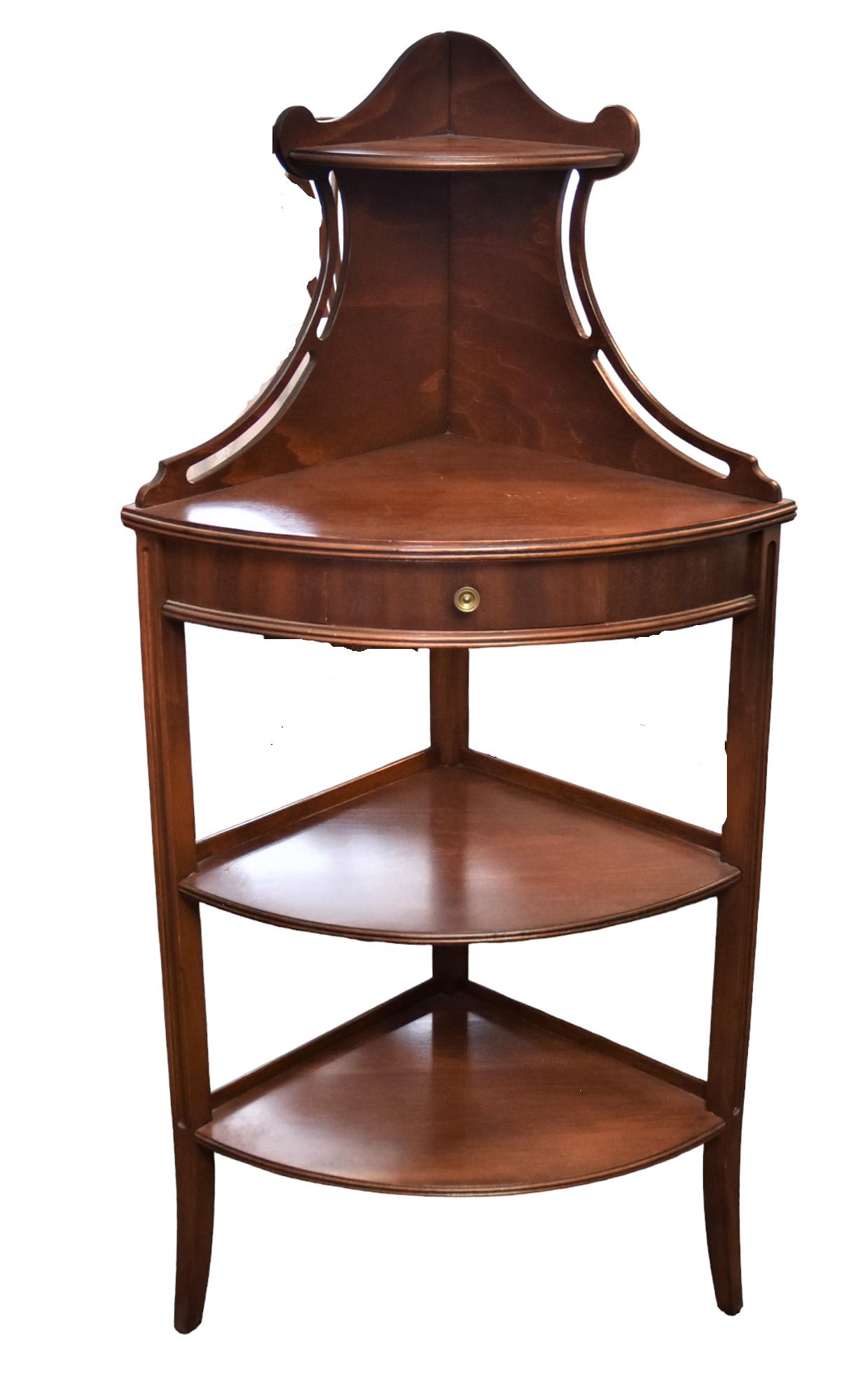 Fine Mahogany Corner Stand: Circa 1940 butler with shaped back, one drawer & two shelves. 43 1/2"h. x 20 1/2" w. Good condition.