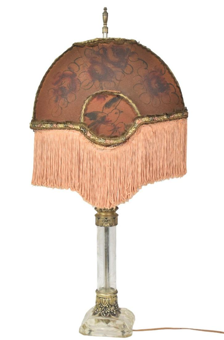 Intaglio Cut Glass Lamp: With silver plated mounts, paneled parchment like shade with polychrome painted florals, hanging silk tassles, 16 x 11 x 32" high.