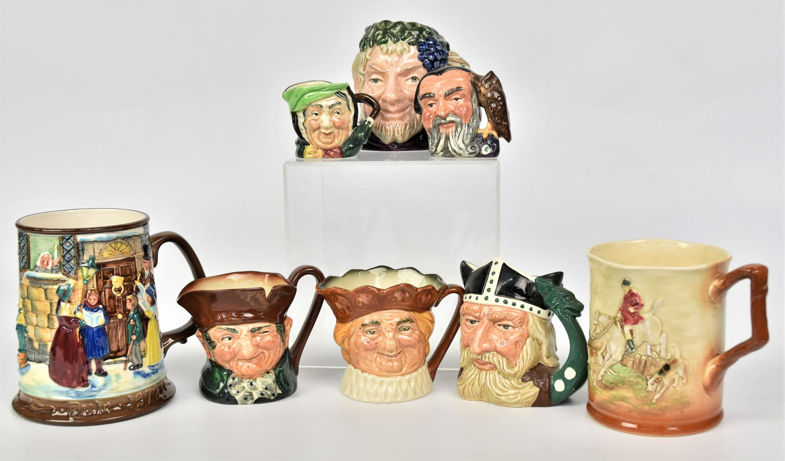 Eight Royal Doulton Steins & Toby Mugs: Includes 2 steins 5"H & 4 1/4" h. All good condition.