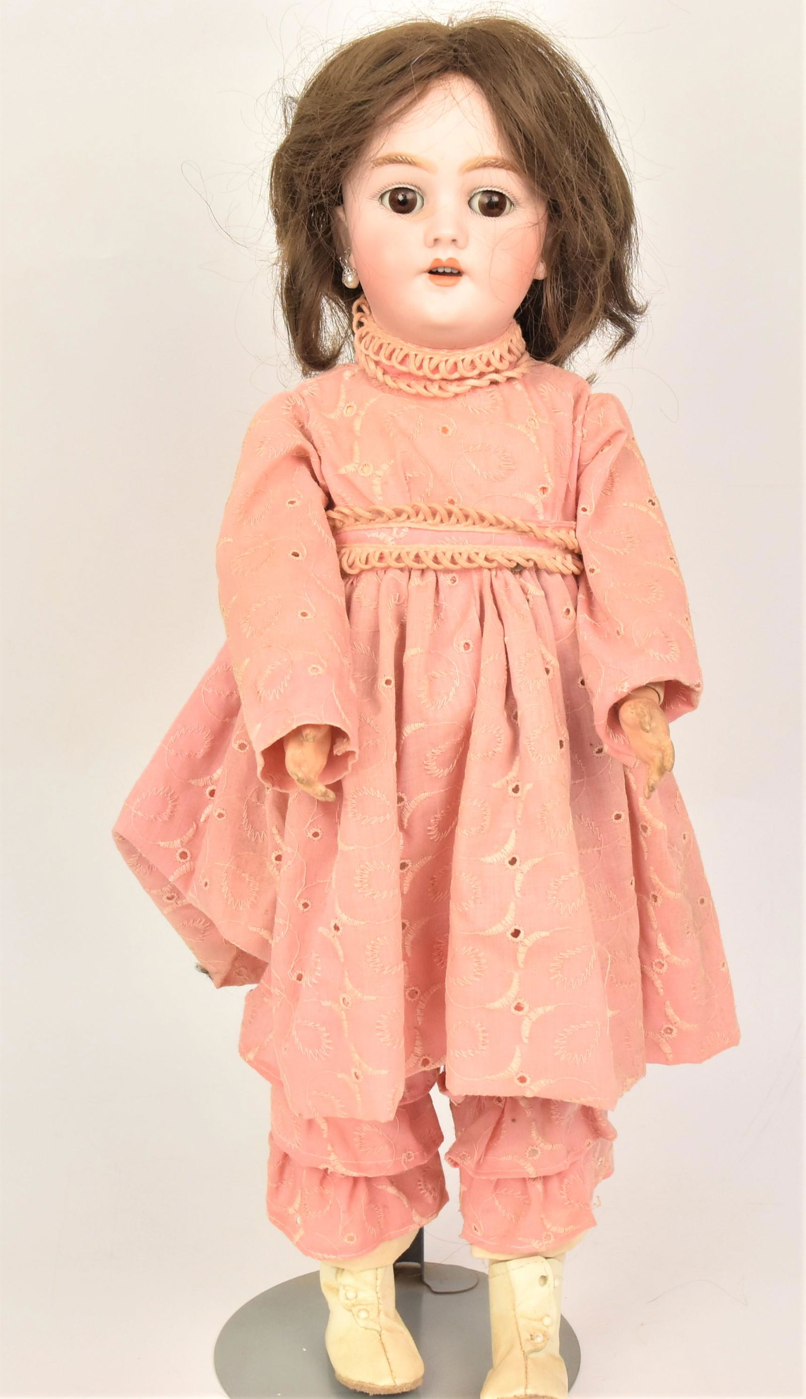 Handwerk Bisque Head Doll NO. 274: Measures 20" H with Brown sleep eyes with pierced ears on socket head and a good jointed composition body, old clothes, old repair to back of head.